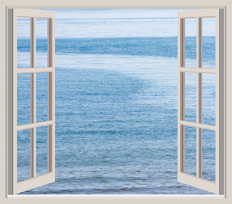 ανοιχτό παράθυρο με θέα τον ωκεανό