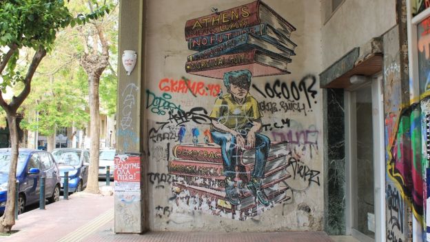 γκράφιτι που δείχνει ένα πιεσμένο Έλληνα