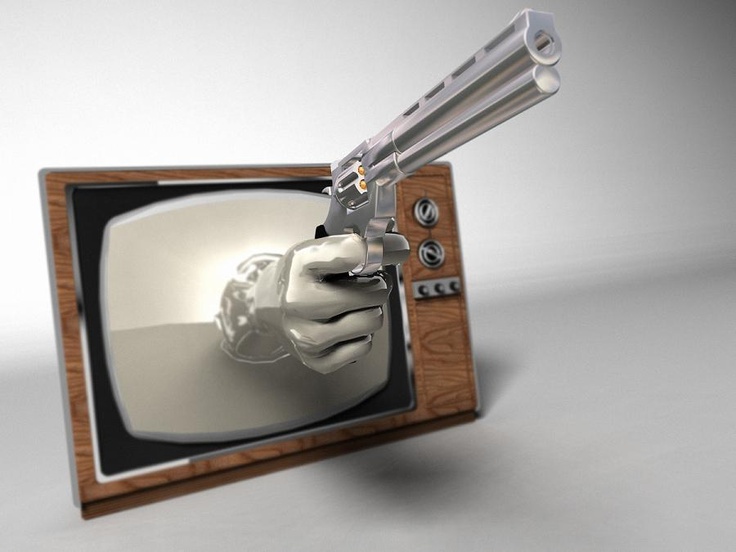 ένα όπλο που βγάινει από την οθόνη μιας τηλεόρασης